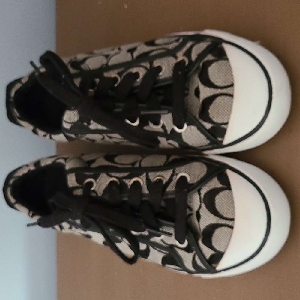 Black and white Coach tennis shoes